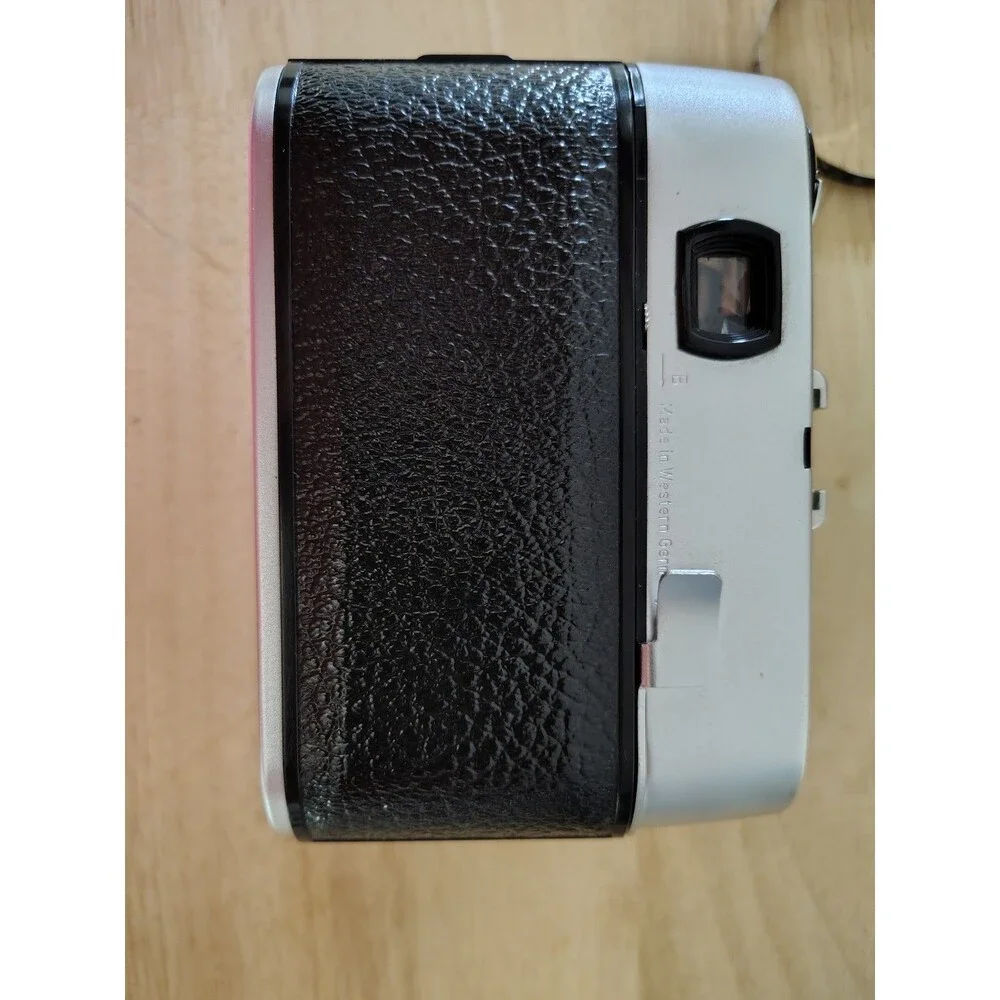Regula Sprinty Camera with Rexar 45mm f/2.8 Lens and nice leather case read des